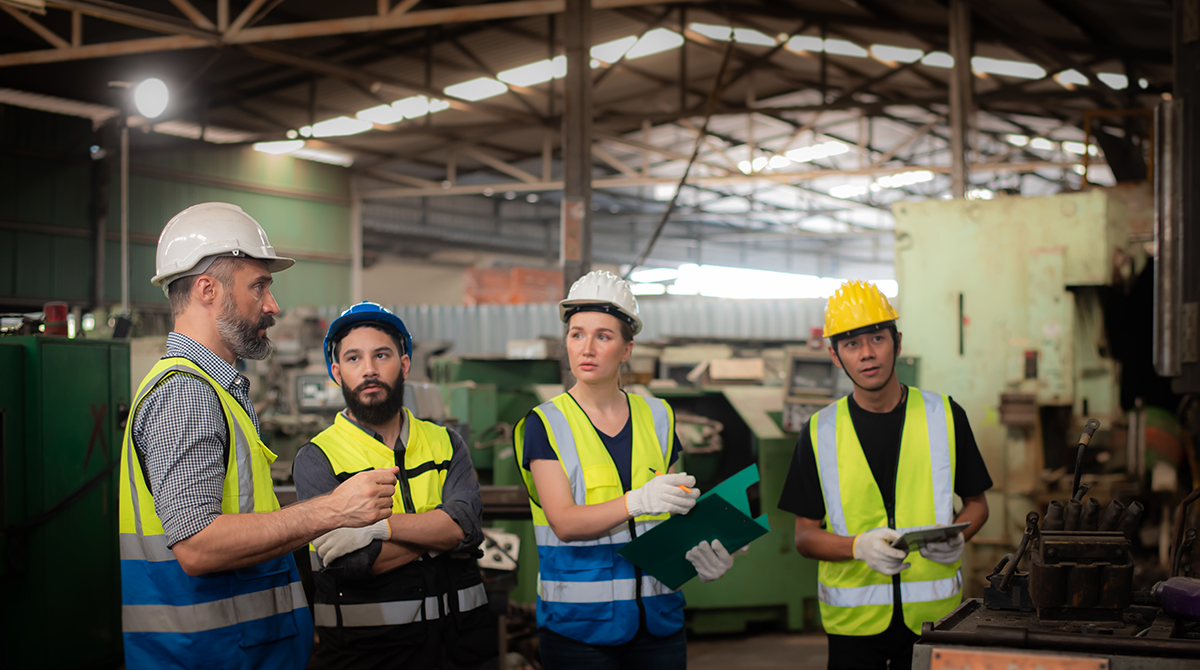 Factory worker practicing job-specific vocabulary to learn a language