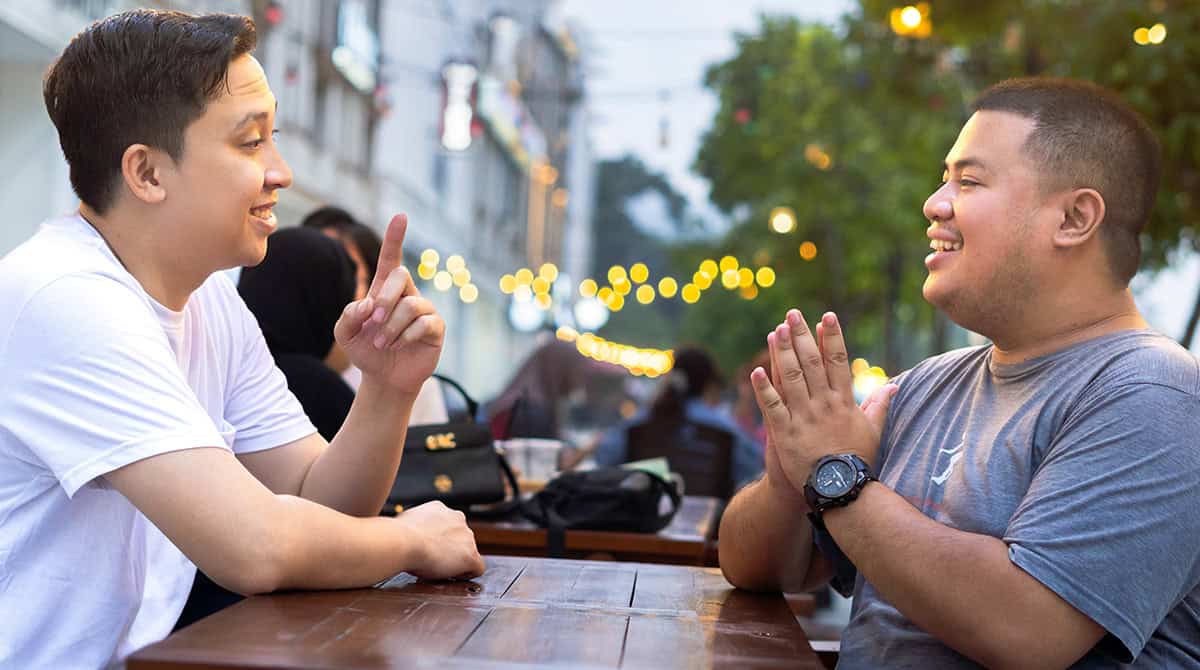 two people talking face to face coffee